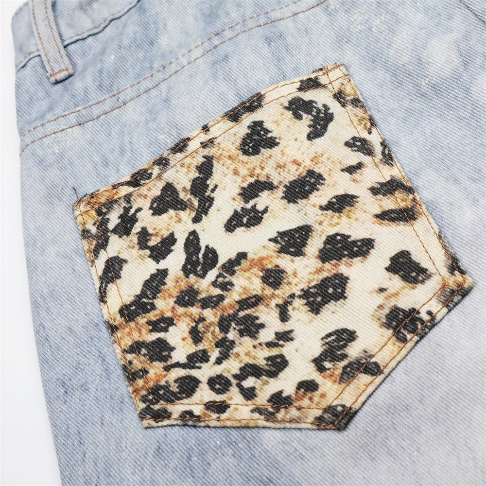 Gradient washed distressed denim shorts