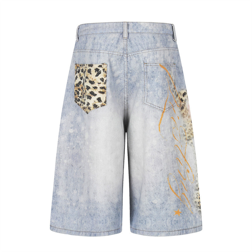 Gradient washed distressed denim shorts